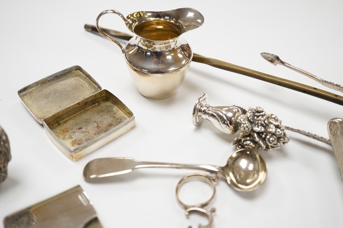 Sundry small silver including two pill boxes, a concave card case, Saunders & Shepherd, Chester, 1897, 79mm, unmarked toddy ladle with baleen handle, 925 flower ornament, small cream jug, two pairs of Georgian sugar tong